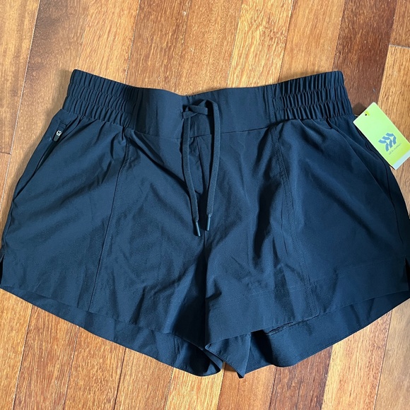 Target All In Motion 4" Woven Mid-Rise Shorts Active - Picture 2 of 3
